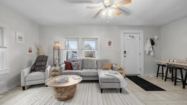 506 Garden St, Mount Pleasant, TN 38474 - living room featuring ceiling fan, light tile patterned floors, and baseboards