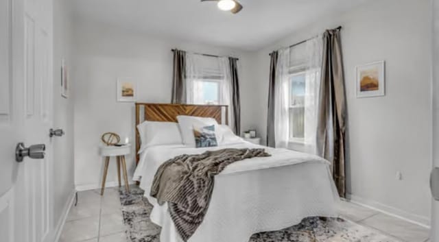506 Garden St, Mount Pleasant, TN 38474 - bedroom featuring light tile patterned flooring and baseboards