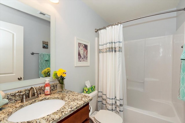 1047 Caballo Trl, Gallatin, TN 37066 - bathroom featuring vanity, shower / bath combo, and toilet