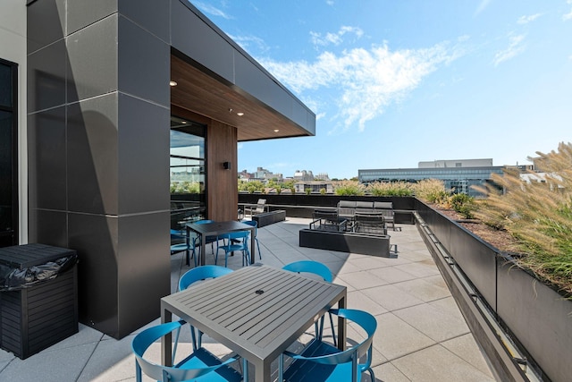 1014 16th Ave S Unit 210, Nashville, TN 37212 - view of patio / terrace featuring outdoor dining space and outdoor lounge area