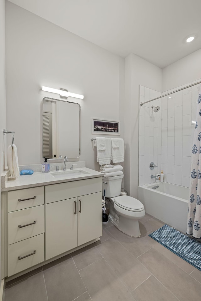 1014 16th Ave S Unit 210, Nashville, TN 37212 - full bath featuring toilet, vanity, shower / tub combo with curtain, tile patterned flooring, and recessed lighting