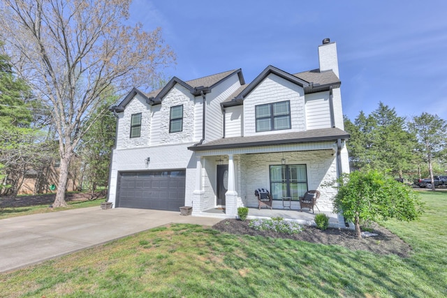 831 W Sagefield Dr, Smyrna, TN 37167 - view of front of house with a porch, an attached garage, a front yard, a chimney, and concrete driveway
