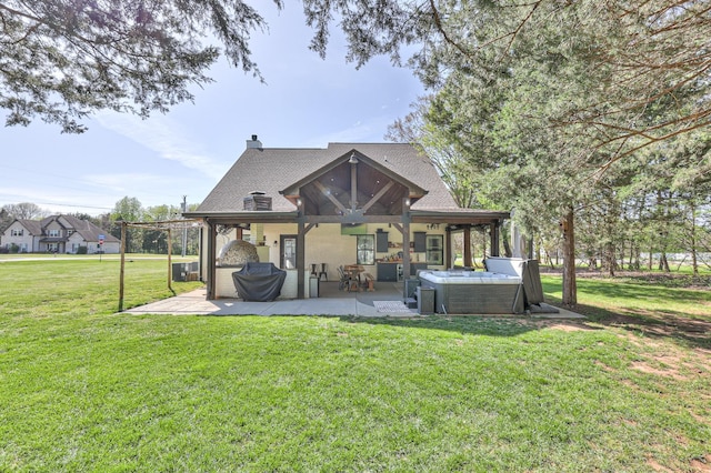 831 W Sagefield Dr, Smyrna, TN 37167 - back of house with a patio, a lawn, ceiling fan, a chimney, and an outdoor living space