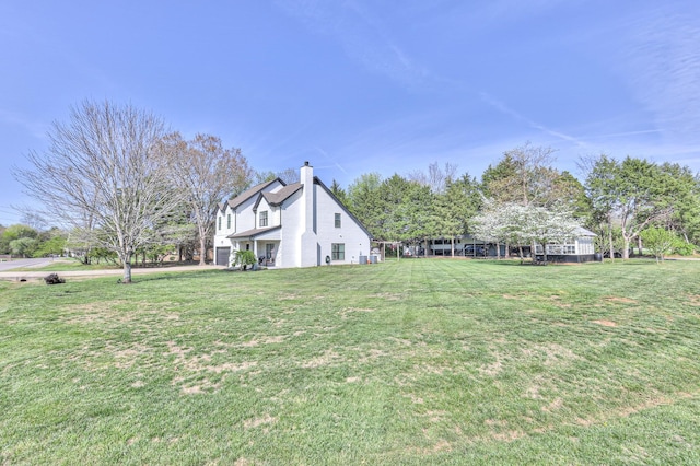 831 W Sagefield Dr, Smyrna, TN 37167 - view of home's exterior featuring a chimney and a yard