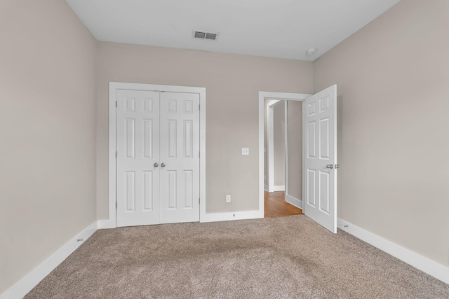 404 Generosity Way, Smyrna, TN 37167 - unfurnished bedroom with carpet, a closet, and baseboards