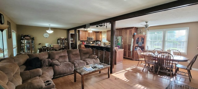 208 Royal Oak Dr, Dickson, TN 37055 - living room with light wood-style flooring and beam ceiling