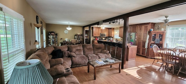 208 Royal Oak Dr, Dickson, TN 37055 - living room with light wood-type flooring, ceiling fan, and beam ceiling