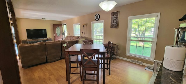 208 Royal Oak Dr, Dickson, TN 37055 - dining area with light wood-style floors and baseboards