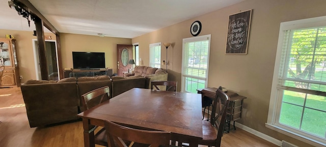 208 Royal Oak Dr, Dickson, TN 37055 - dining area featuring light wood-style floors, healthy amount of natural light, and baseboards