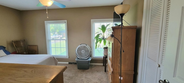 208 Royal Oak Dr, Dickson, TN 37055 - bedroom with carpet, multiple windows, baseboards, and a ceiling fan