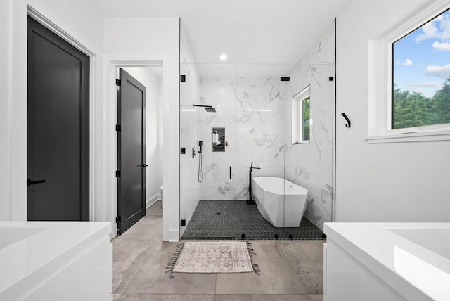 1240 John Windrow Rd, Eagleville, TN 37060 - full bath featuring a marble finish shower, a freestanding tub, and vanity