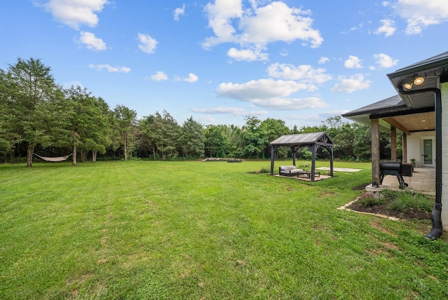1240 John Windrow Rd, Eagleville, TN 37060 - view of green lawn featuring a gazebo and a patio