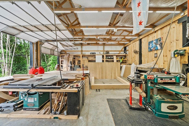 1240 John Windrow Rd, Eagleville, TN 37060 - miscellaneous room with a workshop area and unfinished concrete flooring