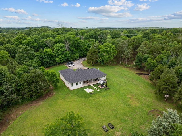 1240 John Windrow Rd, Eagleville, TN 37060 - aerial view of property and surrounding area with a heavily wooded area