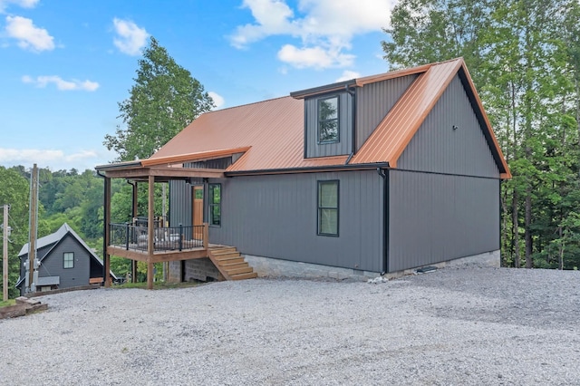 44 Hasty Hill Rd, Lynchburg, TN 37352 - view of front facade featuring a deck, metal roof, and stairs