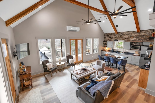 44 Hasty Hill Rd, Lynchburg, TN 37352 - living area featuring high vaulted ceiling, an AC wall unit, ceiling fan, beam ceiling, and light wood finished floors