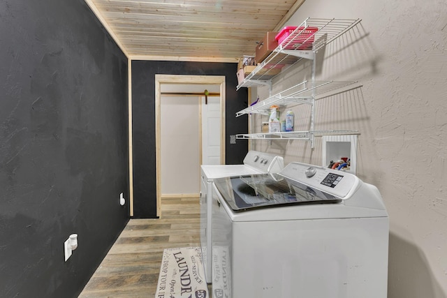 9780 S Lick Creek Rd SW, Lyles, TN 37098 - laundry area with washer and dryer, wood finished floors, and wooden ceiling