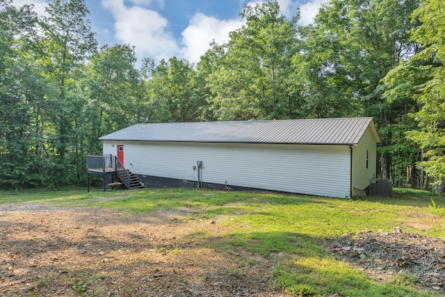 9780 S Lick Creek Rd SW, Lyles, TN 37098 - view of outdoor structure featuring stairway and central AC unit