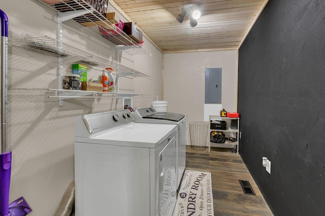 9780 S Lick Creek Rd SW, Lyles, TN 37098 - washroom with electric panel, washing machine and dryer, and wood finished floors