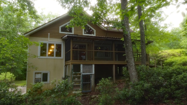 943 Old Ccc Rd, Sewanee, TN 37375 - rear view of property featuring a sunroom and stucco siding