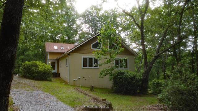 943 Old Ccc Rd, Sewanee, TN 37375 - view of side of home featuring stucco siding