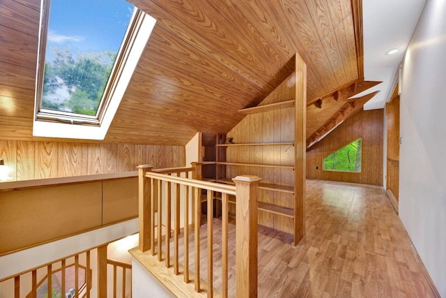 943 Old Ccc Rd, Sewanee, TN 37375 - hallway with an upstairs landing, wood walls, lofted ceiling, a skylight, and wooden ceiling