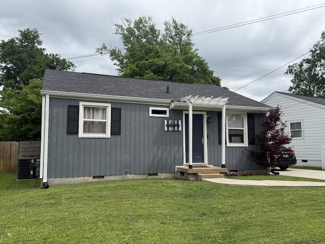 2604 Aspen Dr, Nashville, TN 37208 - view of front facade featuring crawl space, roof with shingles, and central AC unit