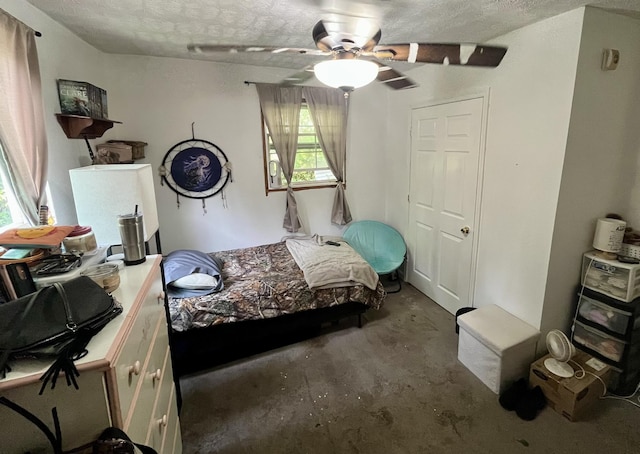 505 Wesley Ave, Nashville, TN 37207 - bedroom with concrete floors, a textured ceiling, and ceiling fan