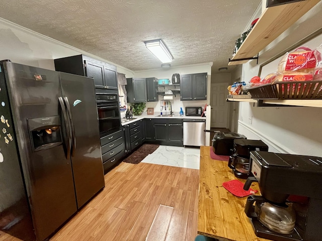 505 Wesley Ave, Nashville, TN 37207 - kitchen with black appliances, light countertops, a sink, light wood-style floors, and open shelves
