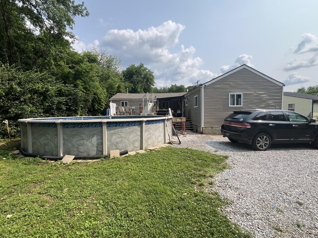505 Wesley Ave, Nashville, TN 37207 - rear view of property with a yard and an outdoor pool
