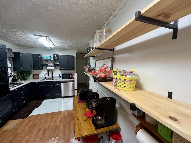 505 Wesley Ave, Nashville, TN 37207 - kitchen featuring open shelves, black microwave, stainless steel dishwasher, light countertops, and a textured ceiling