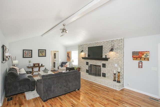321 Amherst Dr, Murfreesboro, TN 37128 - living area featuring light wood-style flooring, a fireplace, a ceiling fan, and baseboards