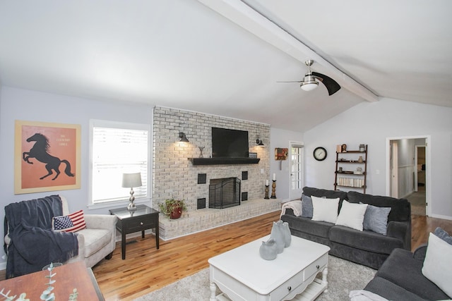 321 Amherst Dr, Murfreesboro, TN 37128 - living room featuring a ceiling fan, wood finished floors, and a fireplace