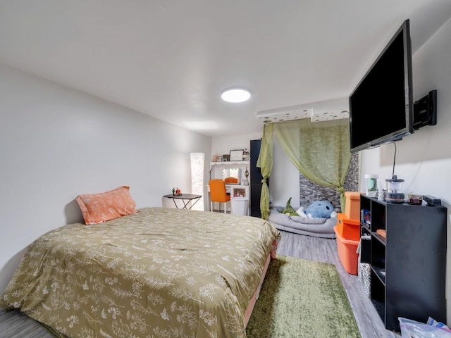 189 Washington Ave, Camden, TN 38320 - bedroom with wood finished floors