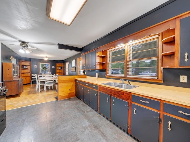 189 Washington Ave, Camden, TN 38320 - kitchen with open shelves, a sink, ceiling fan, and light countertops