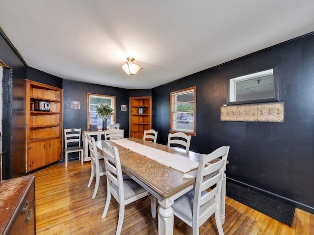 189 Washington Ave, Camden, TN 38320 - dining room featuring light wood-style floors, plenty of natural light, and built in features