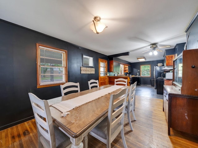 189 Washington Ave, Camden, TN 38320 - dining space with wood finished floors and a ceiling fan