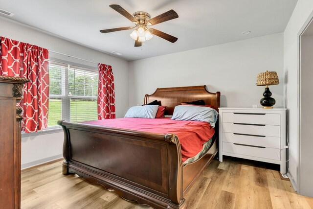 4001 S Windsor Ct, Springfield, TN 37172 - bedroom featuring light wood-type flooring, a ceiling fan, and baseboards