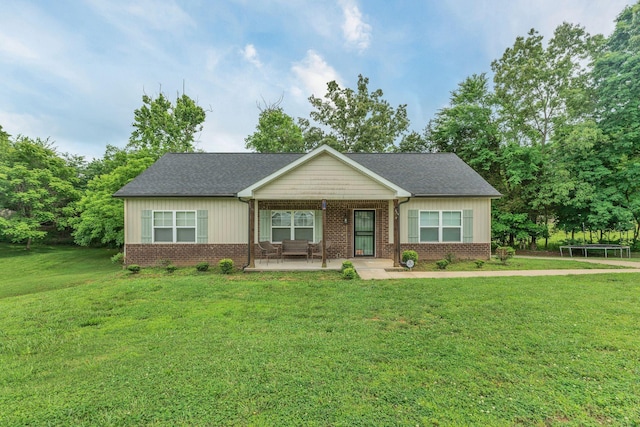 4001 S Windsor Ct, Springfield, TN 37172 - view of front of home featuring brick siding, a front yard, and a shingled roof