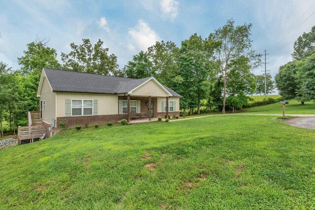 4001 S Windsor Ct, Springfield, TN 37172 - view of front facade featuring brick siding and a front lawn