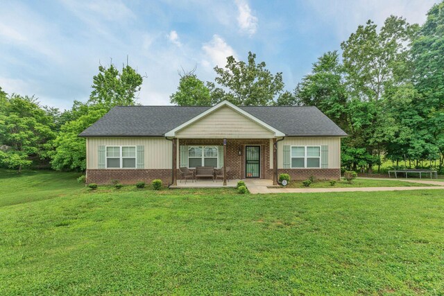 4001 S Windsor Ct, Springfield, TN 37172 - view of front of home featuring brick siding, a front yard, and a shingled roof
