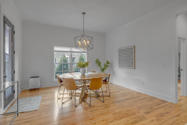 609 Dallas Ct, Murfreesboro, TN 37130 - dining area with a chandelier, ornamental molding, light wood-style flooring, and baseboards