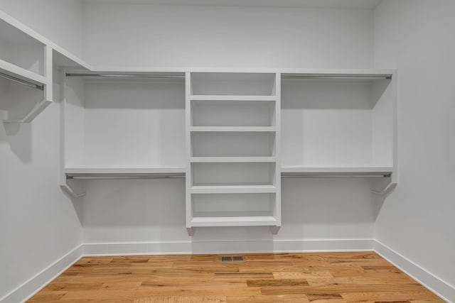 609 Dallas Ct, Murfreesboro, TN 37130 - spacious closet featuring wood finished floors