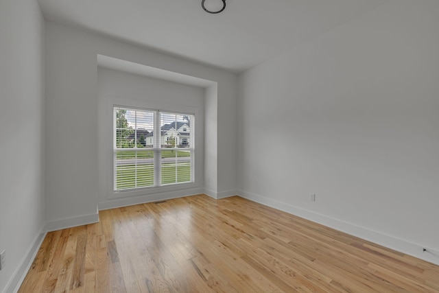609 Dallas Ct, Murfreesboro, TN 37130 - empty room with wood-type flooring and baseboards
