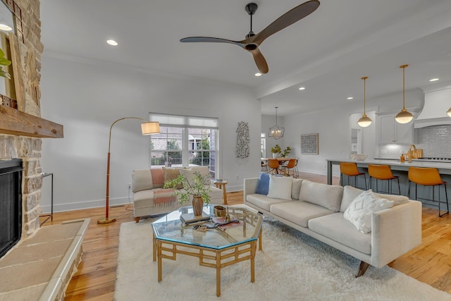 609 Dallas Ct, Murfreesboro, TN 37130 - living room with ceiling fan, light wood-style floors, baseboards, a fireplace, and recessed lighting