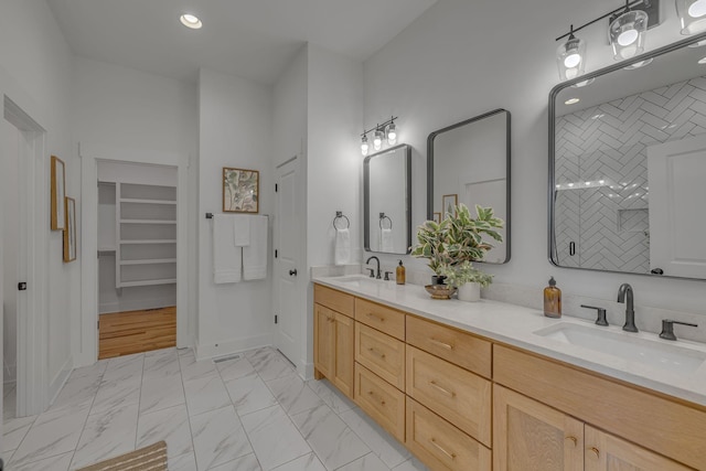 609 Dallas Ct, Murfreesboro, TN 37130 - full bathroom with double vanity, marble look tile flooring, a spacious closet, and recessed lighting