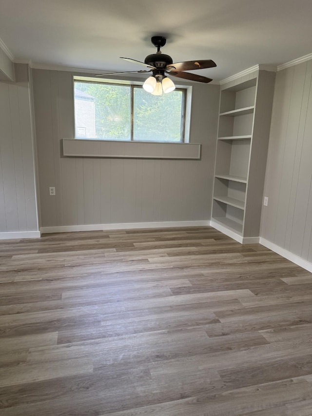 1919 Louanne Dr, Nashville, TN 37217 - spare room featuring baseboards, ceiling fan, wood finished floors, and ornamental molding