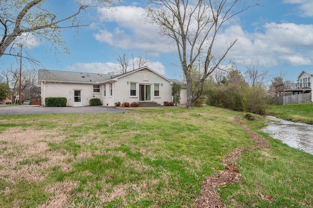 6307 Park Ln, Nashville, TN 37205 - view of front of home with a front yard and asphalt driveway
