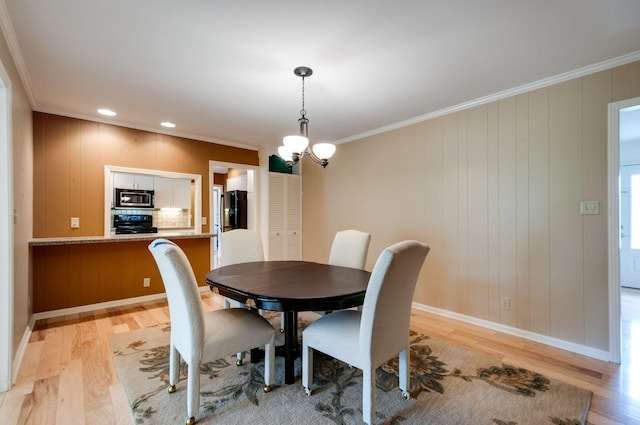 6307 Park Ln, Nashville, TN 37205 - dining room with light wood finished floors, ornamental molding, baseboards, and recessed lighting