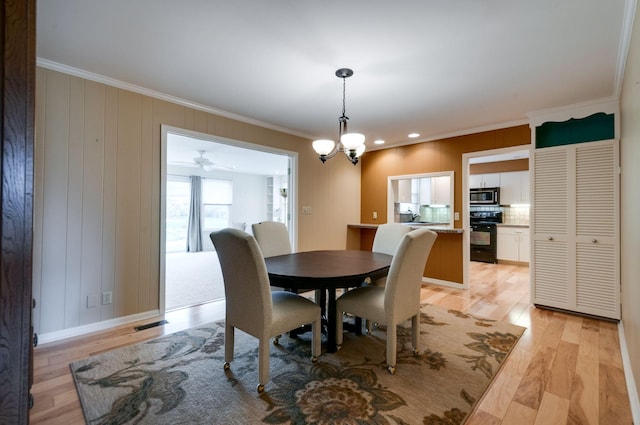 6307 Park Ln, Nashville, TN 37205 - dining area with crown molding, light wood-style floors, and recessed lighting